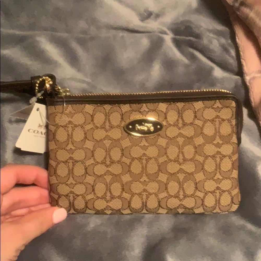 Brown coach wristlet